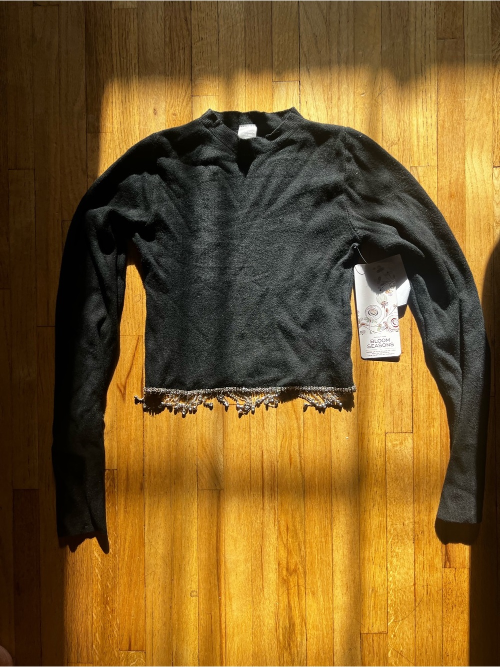 Black Cropped Sweater with Fringed Hem